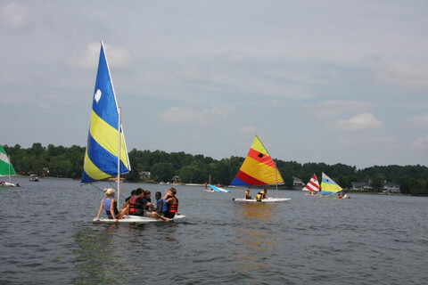 YMCA members enjoy sailing in yachts