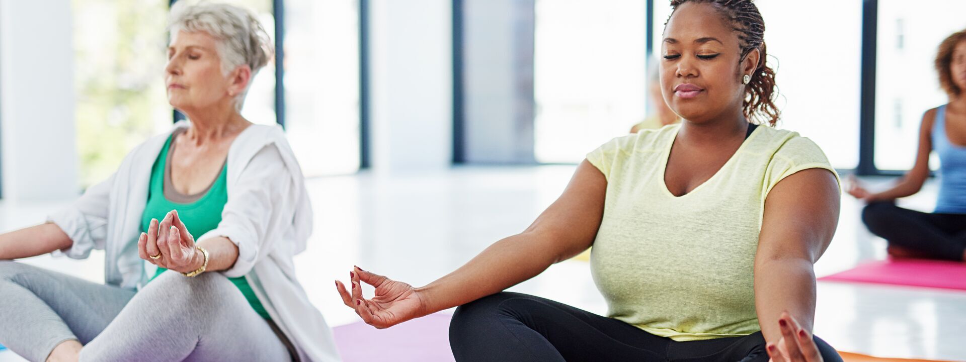 Woman relaxing through meditation at YMCA of Greater Charlotte