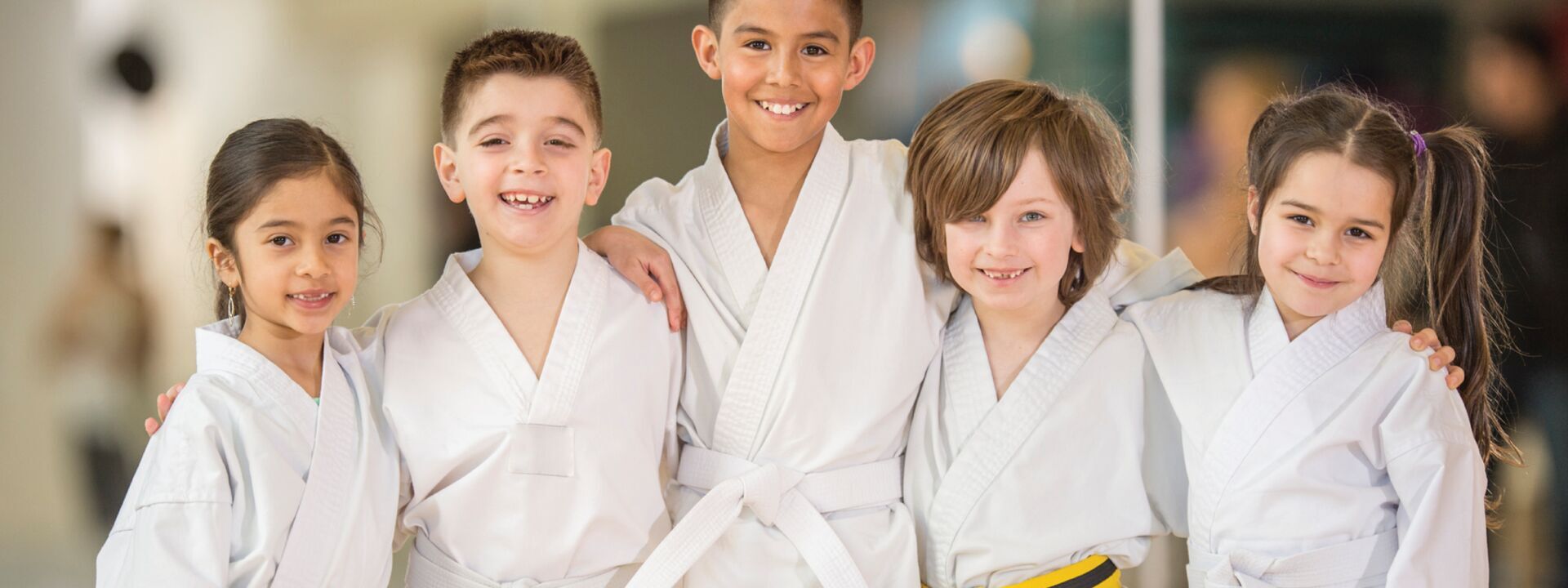 Children in a martial arts uniform at YMCA of Greater Charlotte martial arts class
