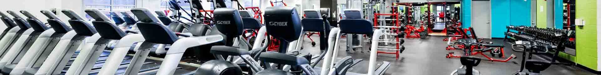 Treadmills and dumbbells in a gym